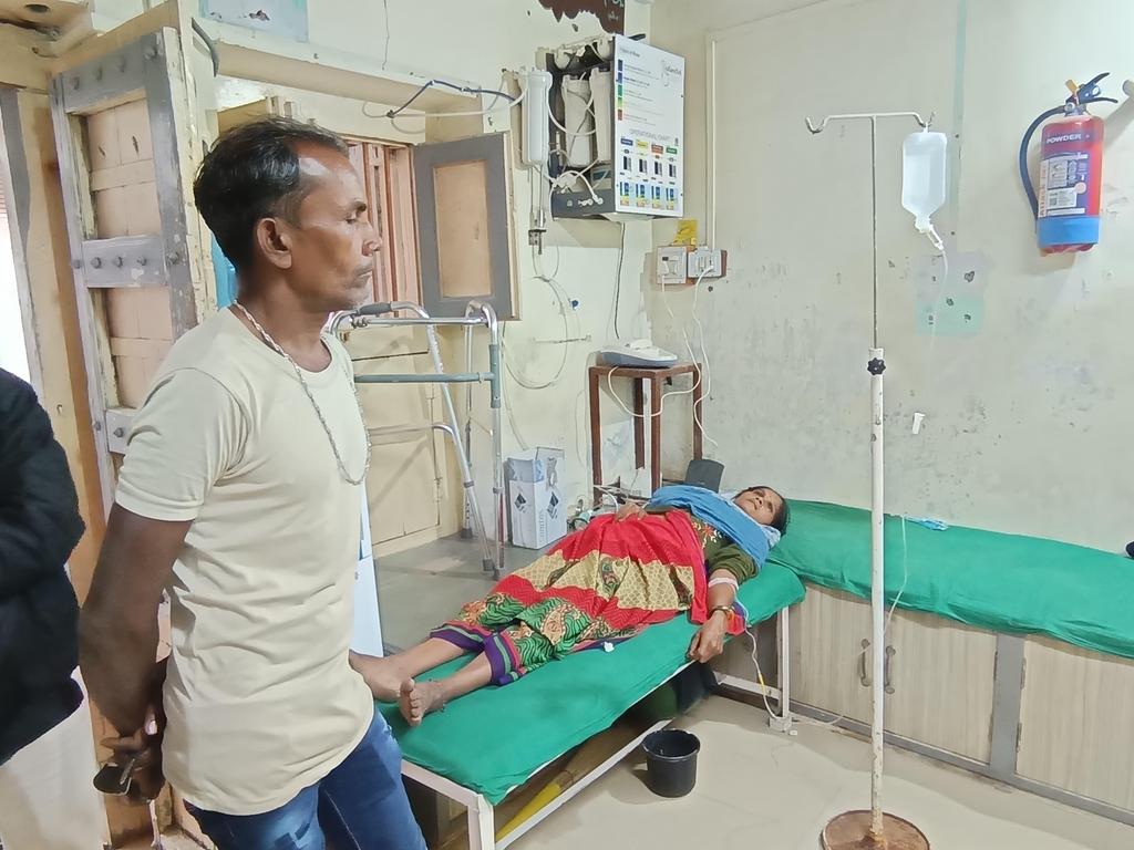 Patient in crowded facility